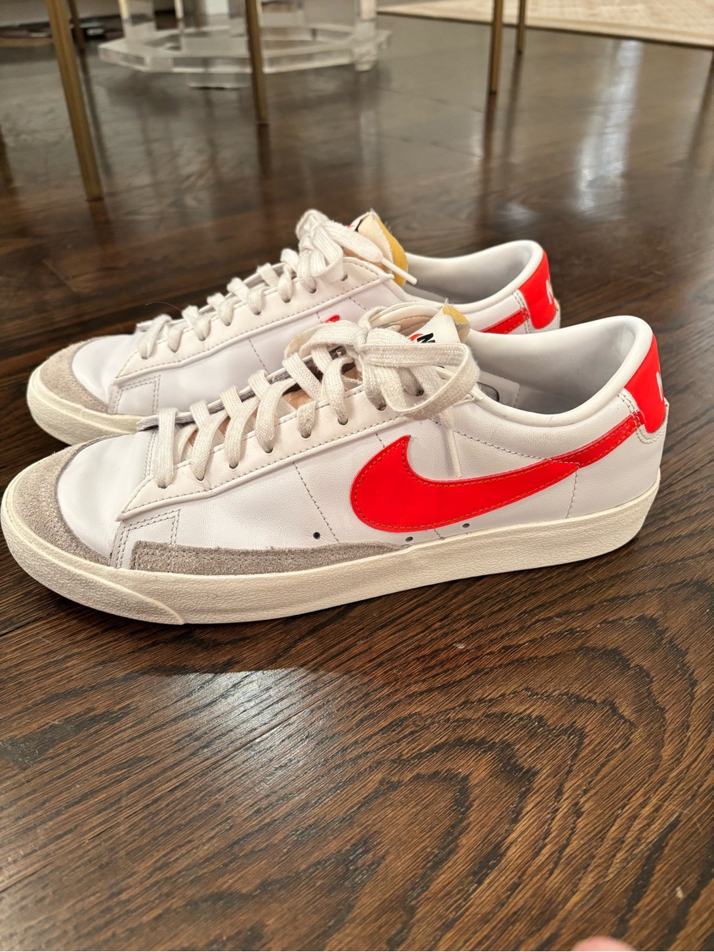 Nike Blazers 77 Low White with Orange Swoosh.
